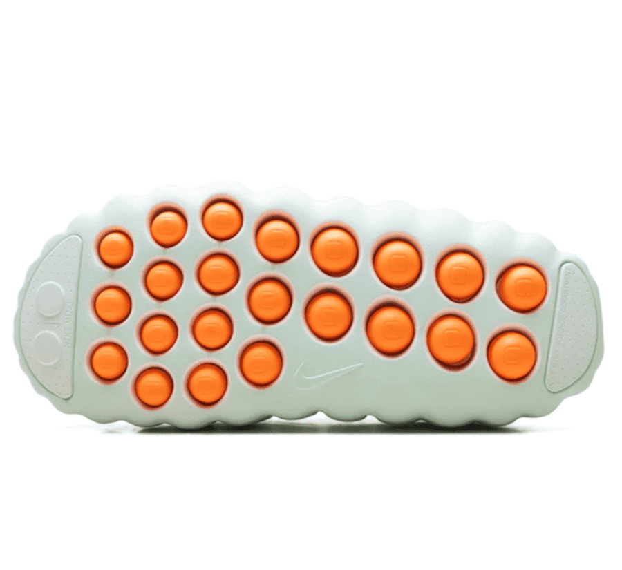 Nike Mind 001 Barely Green Damen Outsole unten mit 22 Hyper Crimson Druckpunkten und Nike Mind Technologie