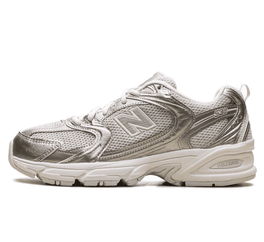 New Balance 530 Gold Metallic Linen Sneaker Paar vorne Perspective