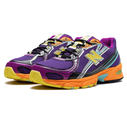 New Balance 740 Concord Grape Sun Glow - lila gelb orangener Sneaker